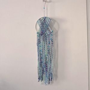 Boho dream catcher with blue variegated yarn and decorative beads